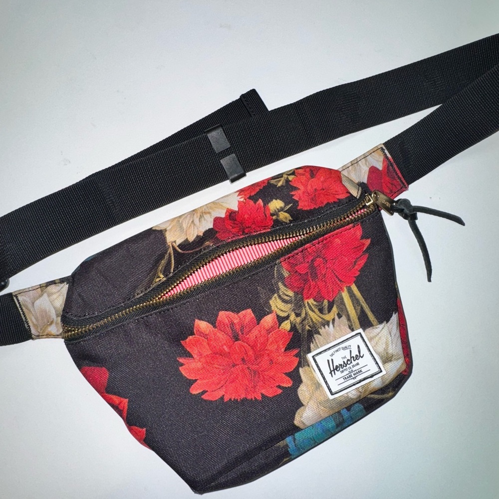Herschel Supply Company Floral Bag with Red and Black Accents